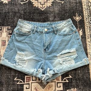Light wash distressed jean shorts